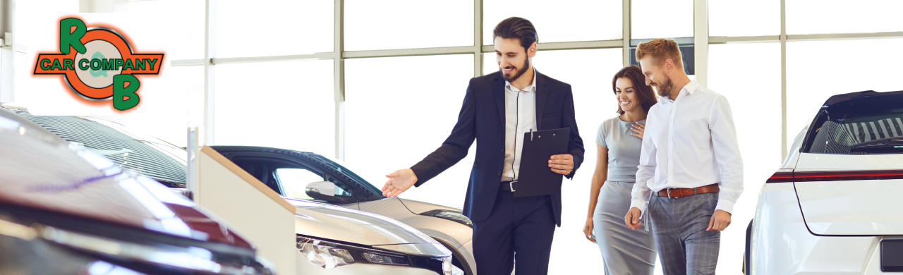 Customer test-driving a used diesel truck at R&B Car Company dealership.