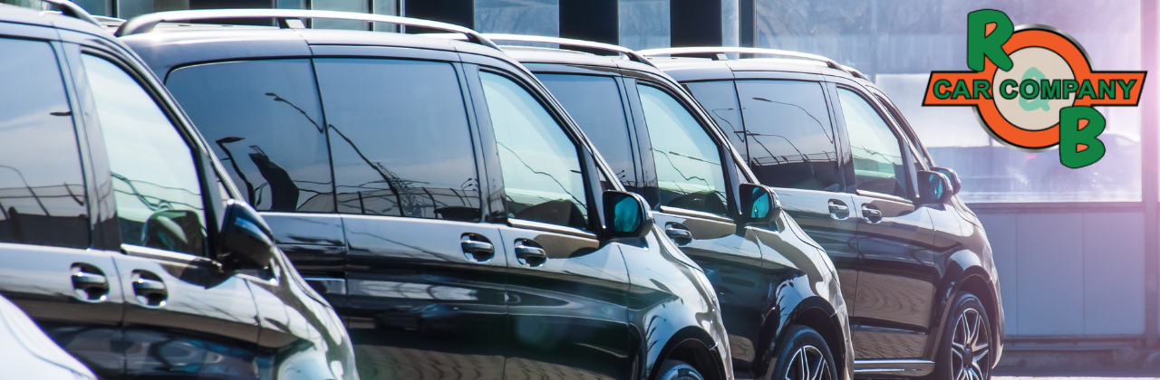 minivans for sale lined up at R&B Car Company South Bend
