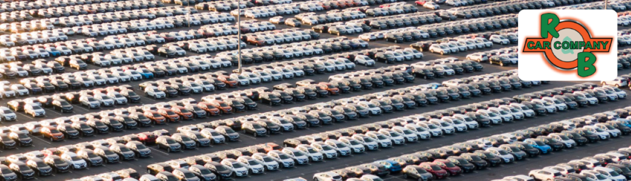  R&B Car Company dealership lot in Elkhart, Indiana showcasing December specials on used vehicles.