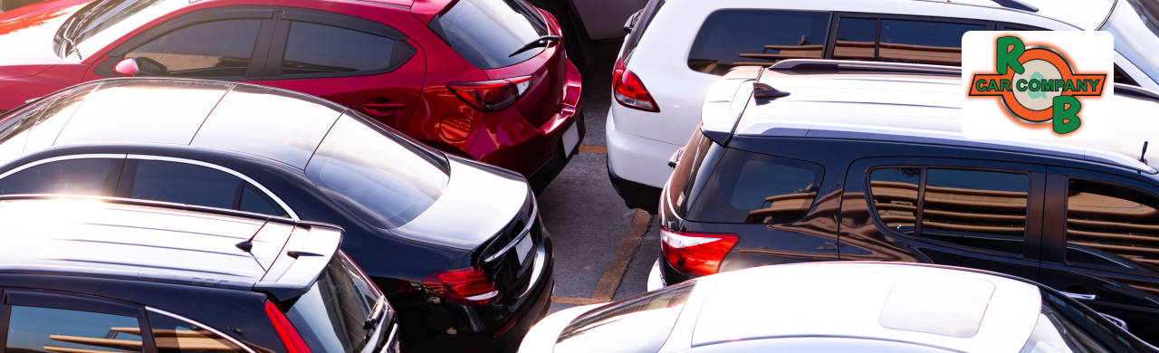 R&B Car Company sales team assisting customers with vehicle selection and financing