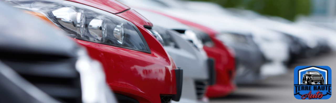 A customer working with a sales associate at Terre Haute Auto to explore affordable cars for sale in Terre Haute