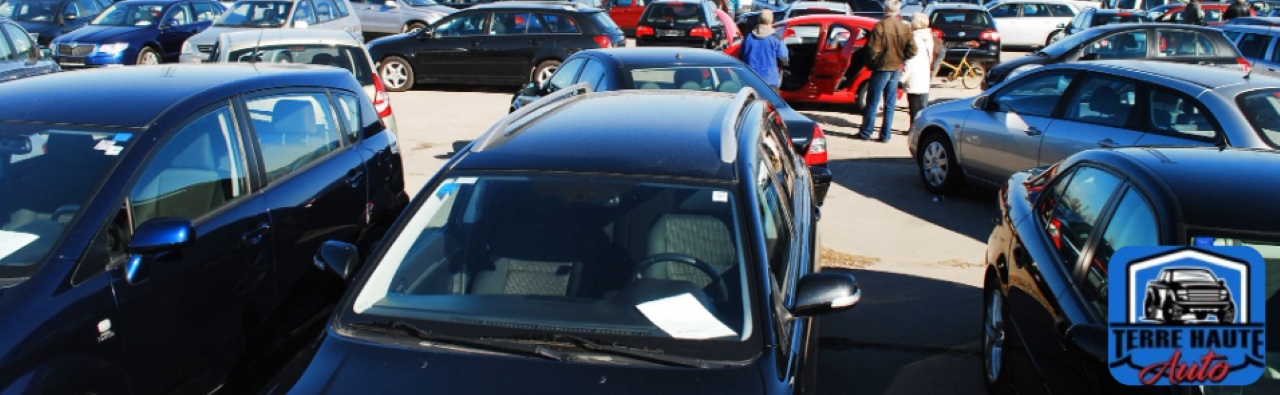 Friendly staff helping local family at Terre Haute Auto, representing hometown dealership service.