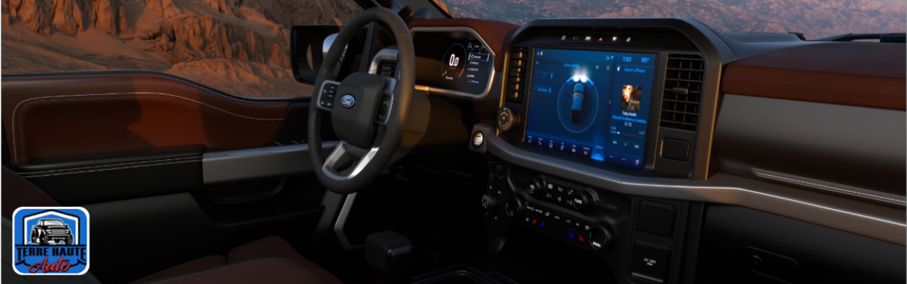 Used Ford F-150 truck parked in Terre Haute dealership lot, showing rugged exterior and clean condition.