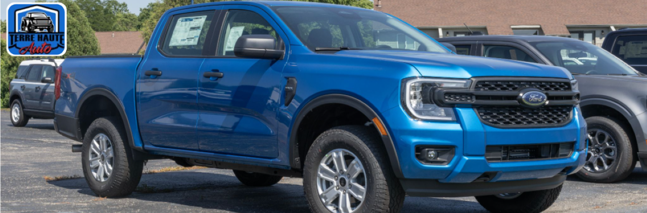 Interior view of a Ford F-150 cabin with infotainment system, showcasing comfort and durability for Indiana drivers.