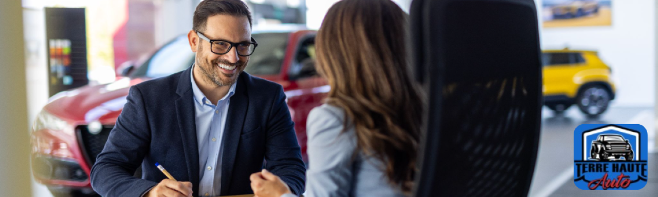  Friendly sales team assisting customers at Terre Haute Auto, a trusted local car shop in the Wabash Valley